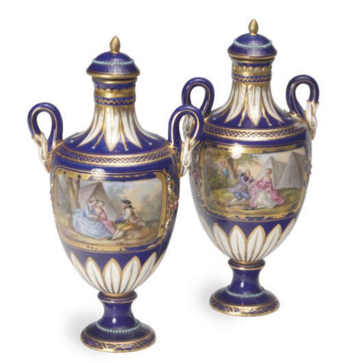 A PAIR OF SÈVRES-STYLE COBALT BLUE-GROUND 'JEWELLED' PORCELAIN VASES AND COVERS,