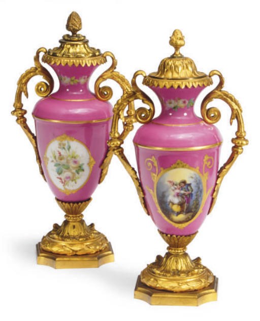 A PAIR OF GILT-BRONZE MOUNTED SÈVRES-STYLE PINK GROUND PORCELAIN VASES AND ASSOCIATED COVERS,