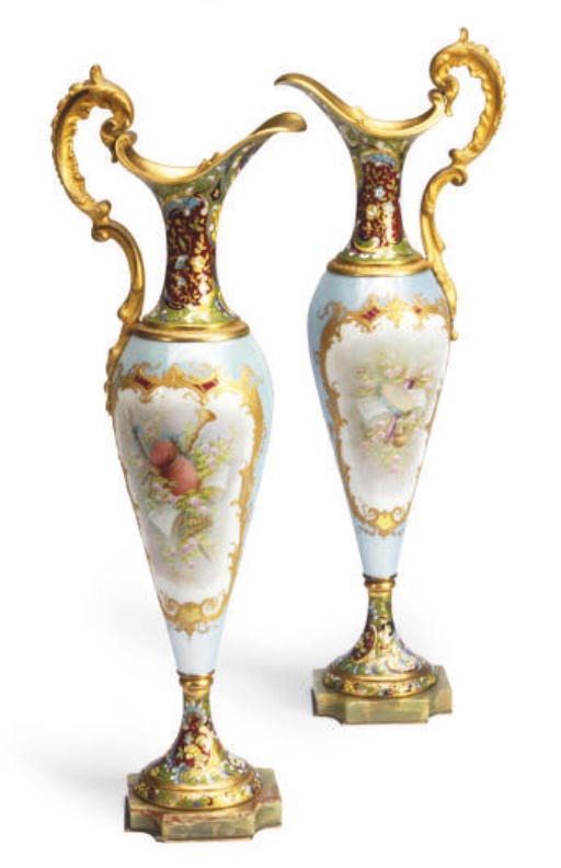A PAIR OF CHAMPLEVE ENAMEL AND SÈVRES-STYLE PORCELAIN EWERS,