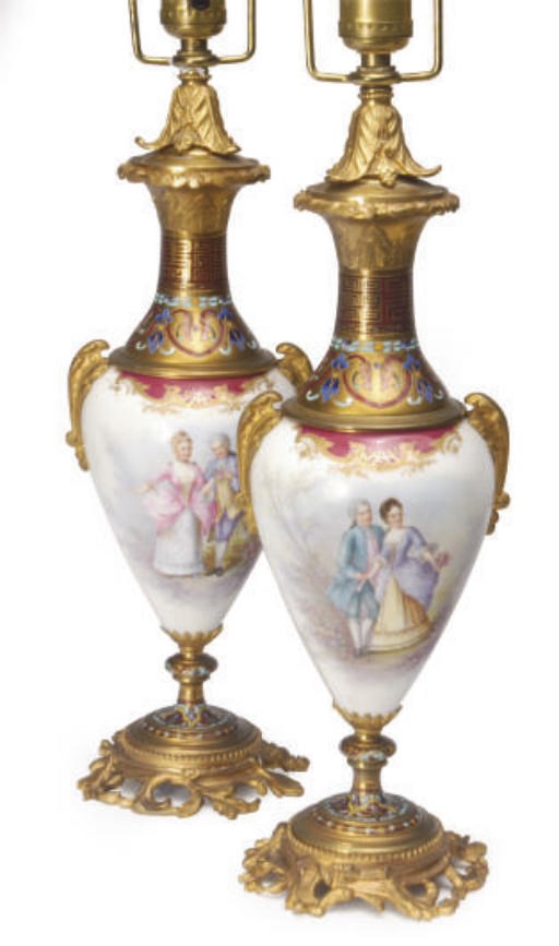 A PAIR OF GILT METAL MOUNTED CHAMPLEVE ENAMEL AND SÈVRES STYLE PORCELAIN BALUSTER VASES,
