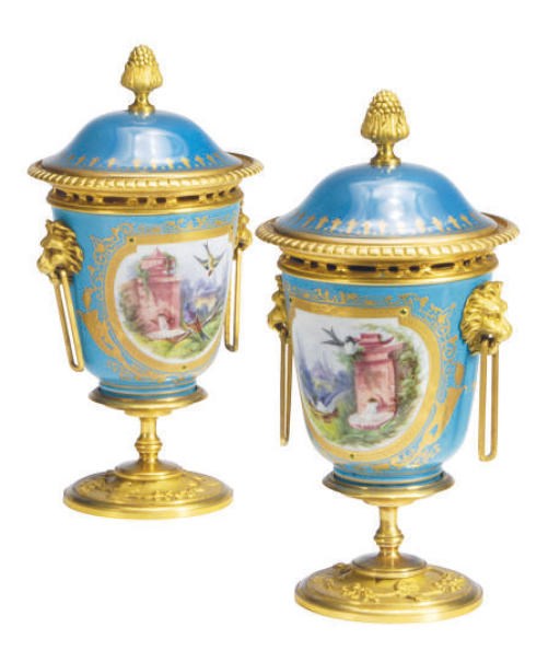 A PAIR OF GILT-METAL MOUNTED SÈVRES-STYLE TURQUOISE-GROUND VASES AND COVERS,