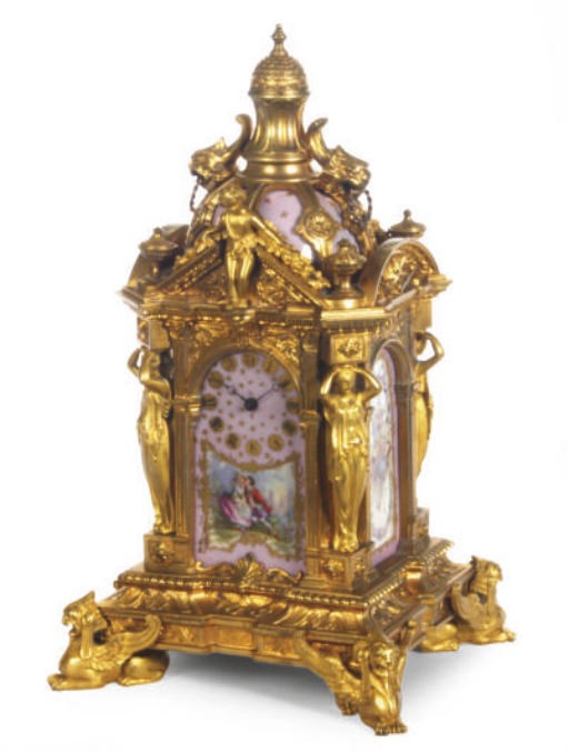 A GILT-METAL MOUNTED SÈVRES STYLE PINK-GROUND PORCELAIN MANTEL CLOCK,