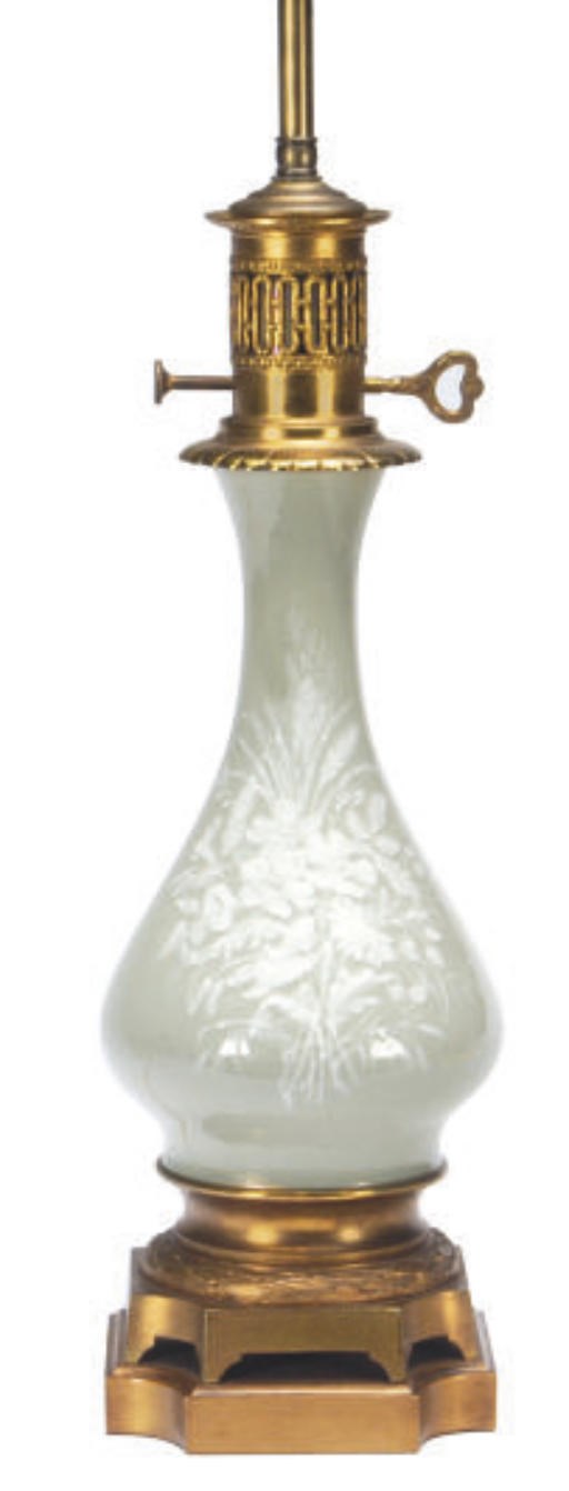 A LIMOGES CELADON-GROUND PATE-SUR-PATE VASE MOUNTED AS A LAMP,