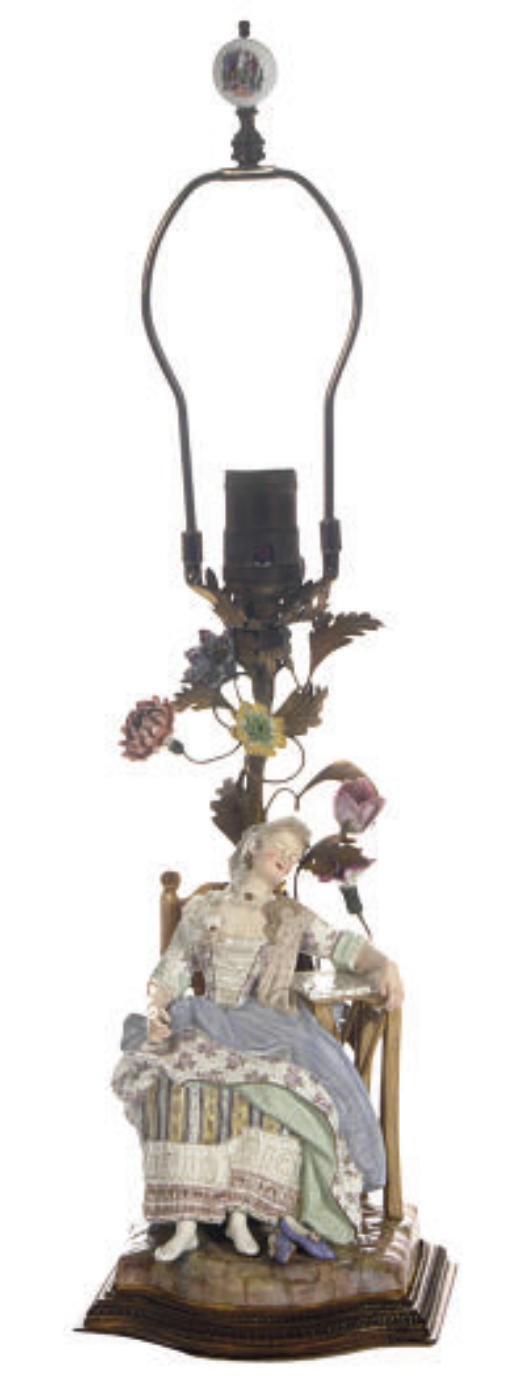 A GERMAN FIGURE OF A SLEEPING MAIDEN MOUNTED AS A LAMP,