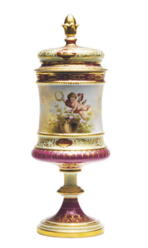 A VIENNA-STYLE PORCELAIN BURGUNDY AND PALE-GREEN GROUND CHALICE-FORM PORCELAIN VASE AND COVER,