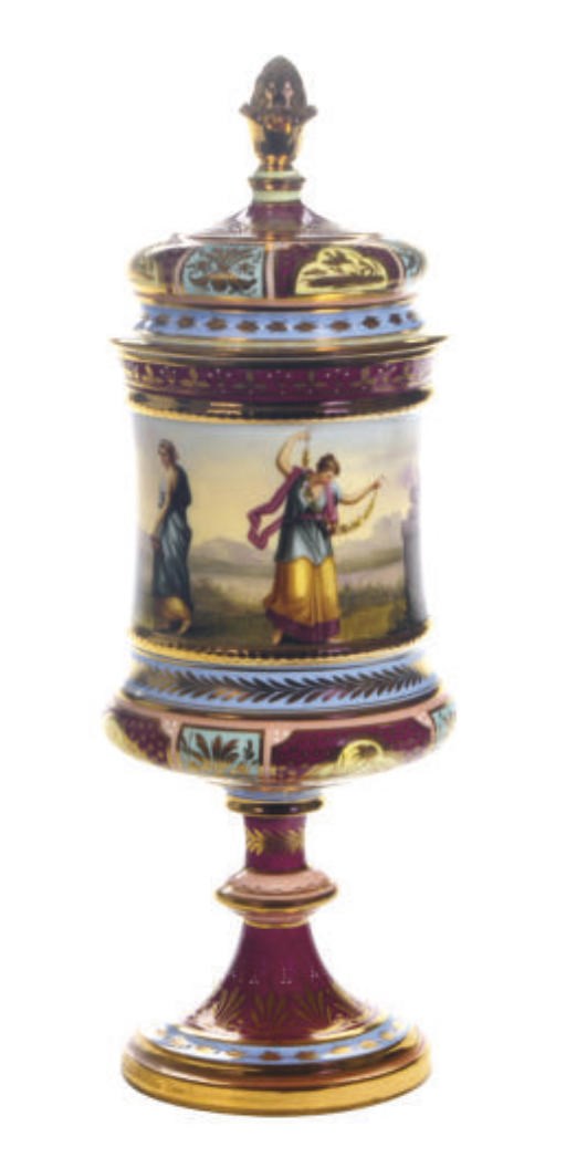 A VIENNA-STYLE BURGUNDY AND PALE-BLUE-GROUND PORCELAIN CHALICE-FORM VASE AND COVER,