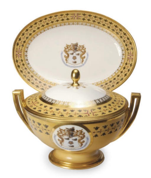 A FRENCH PORCELAIN ARMORIAL CUSTARD YELLOW GROUND PART DINNER SERVICE,