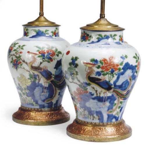 A PAIR OF CHINESE WUCAI BALUSTER JARS MOUNTED AS LAMPS,