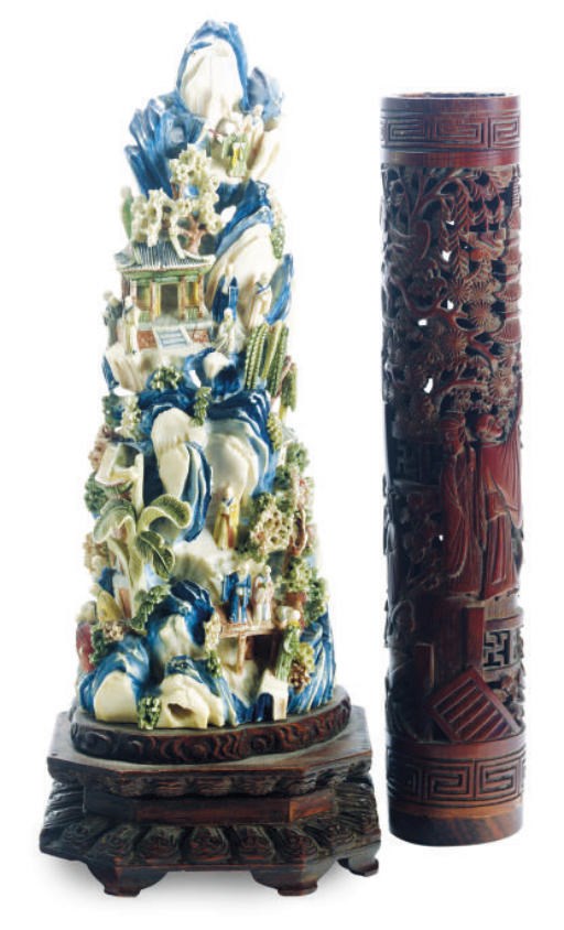 A CHINESE IVORY CARVING OF A MOUNTAIN LANDSCAPE AND A WOOD BRUSH POT,**