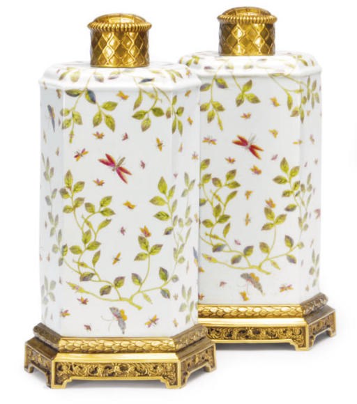 A PAIR OF GILT BRONZE-MOUNTED PORCELAIN HEXAGONAL LARGE TEA CADDIES AND COVERS,
