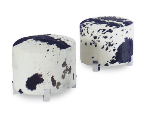 A PAIR OF PONYSKIN AND CHROME OTTOMANS,