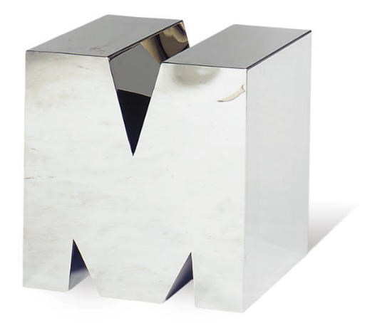 A CHROMED-METAL 'LETTER M' SIDE TABLE,