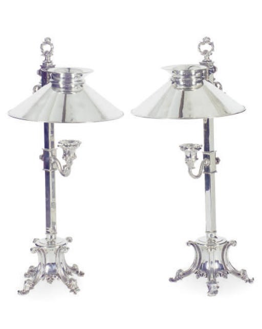 A PAIR OF CHROMED-METAL ADJUSTABLE CANDLEHOLDERS,