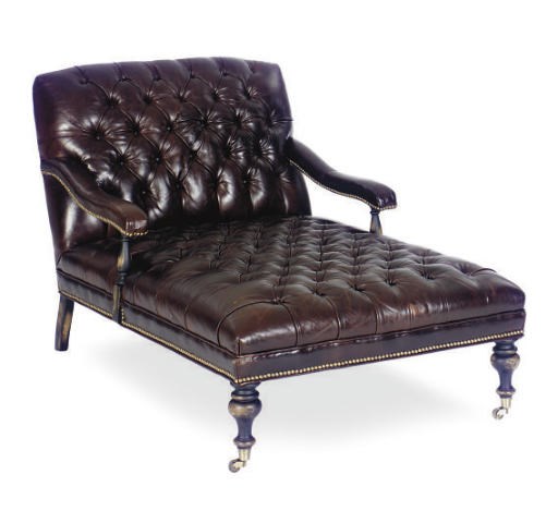A STAINED WOOD AND BUTTON-TUFTED BROWN LEATHER CHAISE LONGUE,