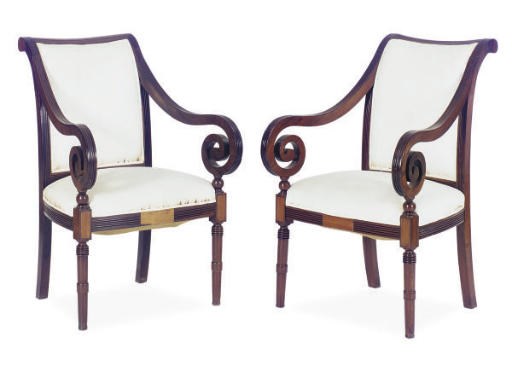 A PAIR OF COLONIAL ROSEWOOD OPEN ARMCHAIRS**,