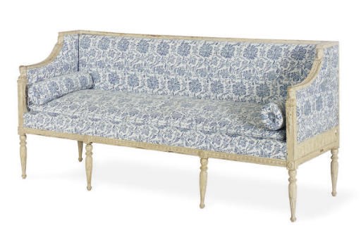 A CREAM PAINTED BLUE AND WHITE UPHOLSTERED SOFA,
