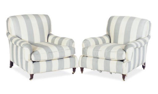 A PAIR OF BLUE AND WHITE RAW SILK UPHOLSTERED LOW CLUB CHAIRS