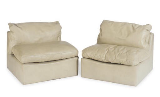 A SET OF THREE LEATHER LOW LOUNGE CHAIRS,