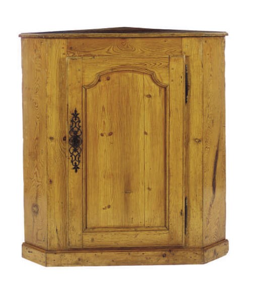A FRENCH PINE CORNER CUPBOARD,