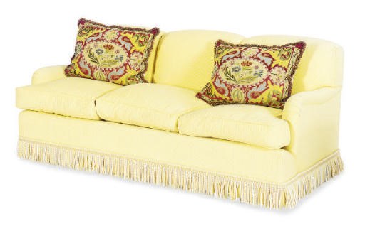 A YELLOW COTTON UPHOLSTERED SOFA,