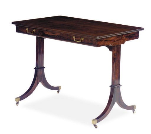 A BRASS-INLAID ROSEWOOD WRITING TABLE**,