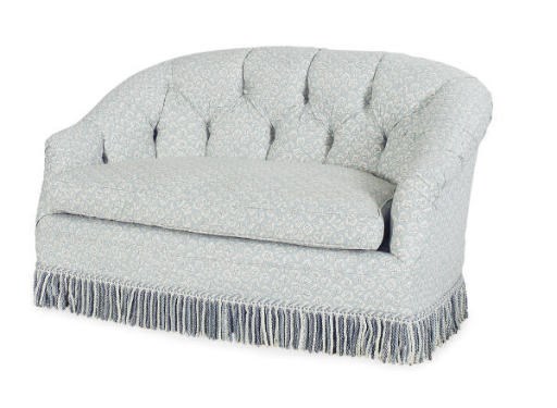 A BLUE AND WHITE PATTERN COTTON UPHOLSTERED LOVESEAT,