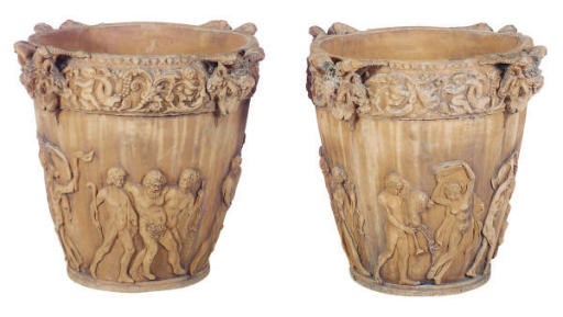 A PAIR OF RELIEF MOLDED GARDEN PLANTERS,