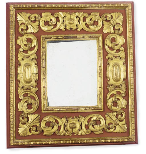 A RED PAINTED AND PARCEL-GILT MIRROR,
