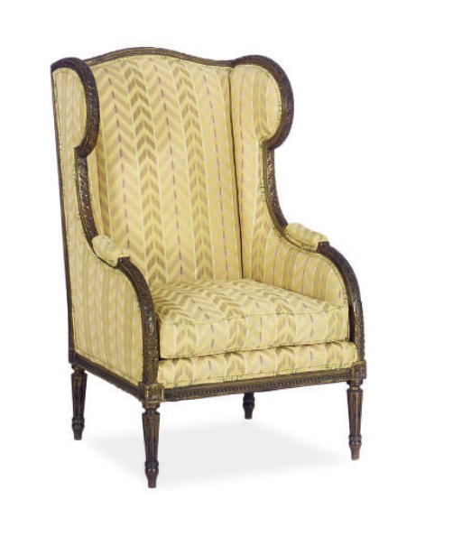A PARCEL-GILT AND UPHOLSTERED WINGBACK ARMCHAIR,