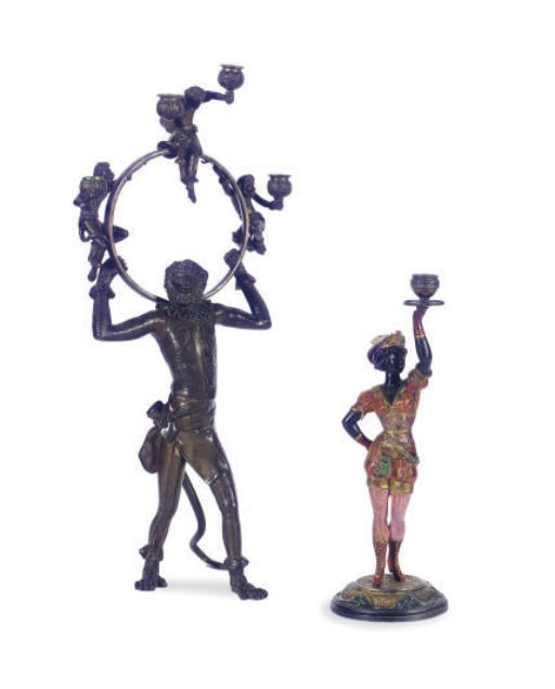 A PATINATED BRONZE FIGURAL FOUR-LIGHT CANDELABRUM,