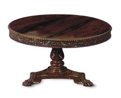 A VICTORIAN ROSEWOOD CENTER TABLE**,