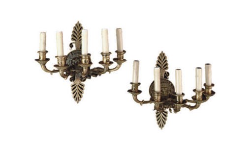 A PAIR OF FRENCH BRONZE AND PARCEL-GILT FIVE-BRANCH WALL-LIGHTS,