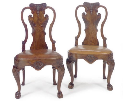 A SET OF SIX WALNUT DINING CHAIRS,