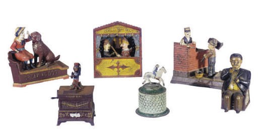 A TAMMANY CAST IRON MECHANICAL BANK,