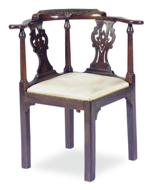 A GEORGE III MAHOGANY CORNER CHAIR,