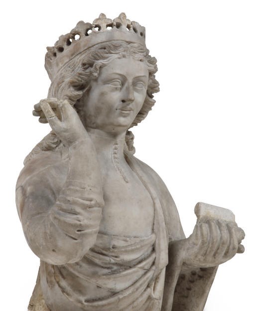 A CARVED MARBLE BUST OF A CROWNED FEMALE SAINT