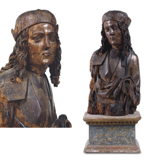 A POLYCHROME CARVED WOOD HALF-LENGTH MALE FIGURE