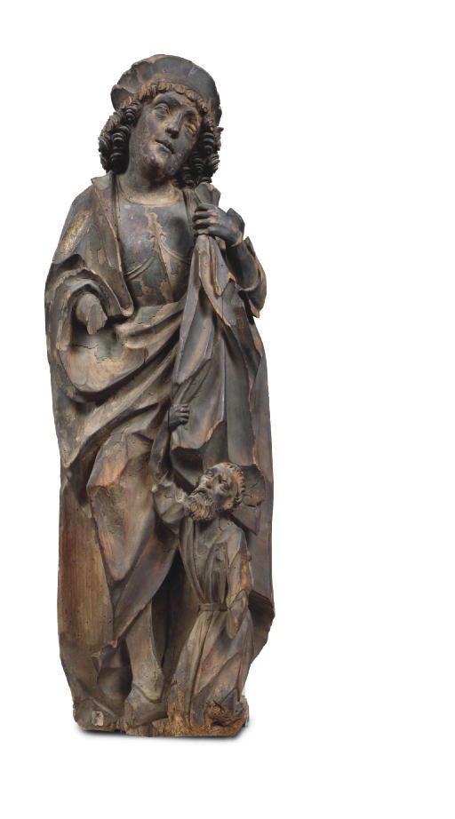 A POLYCHROME PARCEL-GILT CARVED LIMEWOOD HIGH RELIEF OF SAINT MARTIN