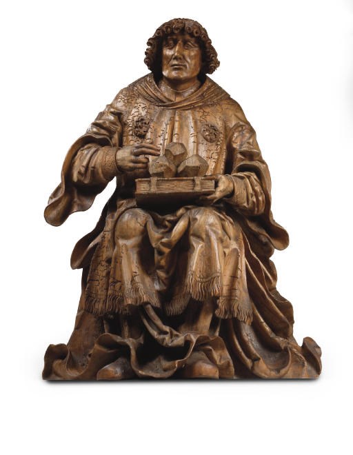 A CARVED LIMEWOOD FIGURE OF SAINT STEPHEN