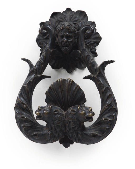 A BRONZE DOOR KNOCKER