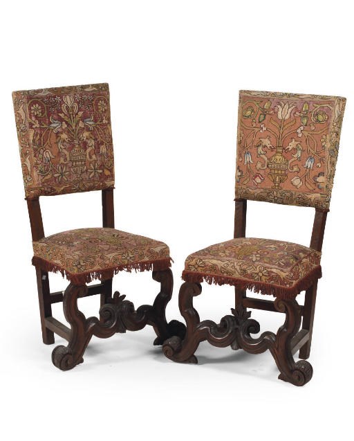 A PAIR OF ITALIAN CARVED WALNUT SIDE CHAIRS