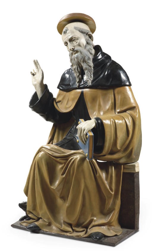 A NORTH EUROPEAN POLYCHROME-GLAZED TERRACOTTA FIGURE OF SAINT ANTHONY