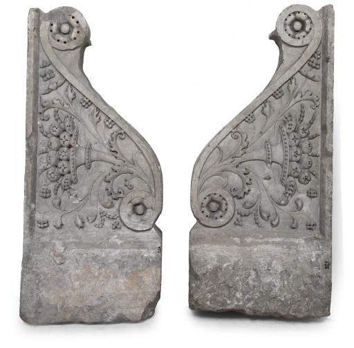 A PAIR OF ITALIAN CARVED HARDSTONE BRACKETS