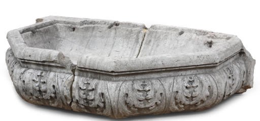 A NORTH ITALIAN CARVED HARDSTONE WALL BASIN