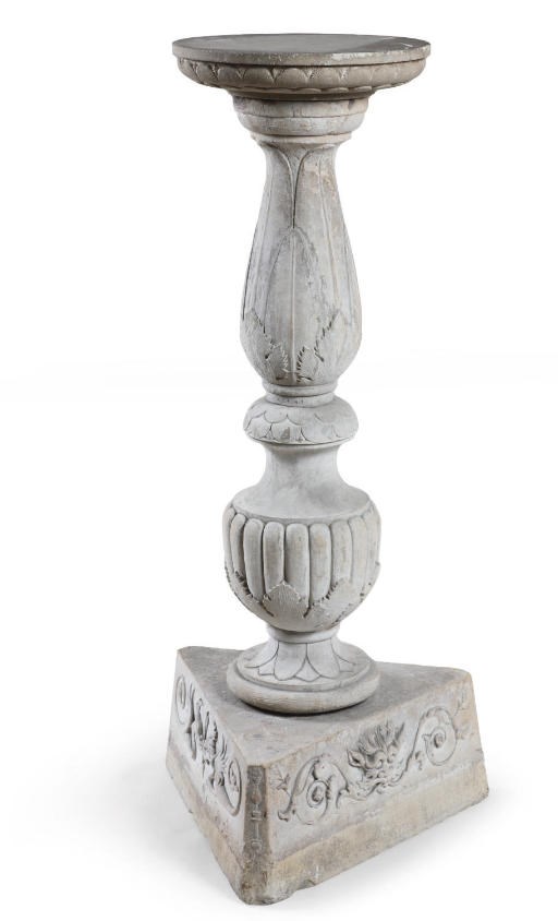AN ITALIAN CARVED HARDSTONE PEDESTAL