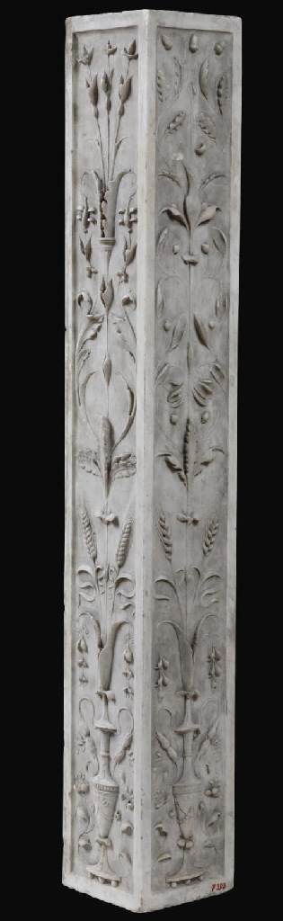 AN ITALIAN CARVED WHITE MARBLE ARCHITECTURAL CORNER ELEMENT