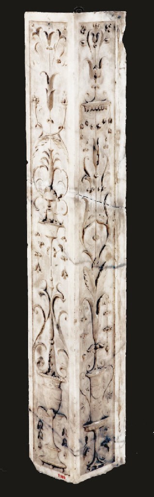AN ITALIAN CARVED WHITE MARBLE ARCHITECTURAL CORNER ELEMENT