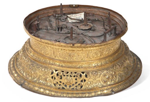 A SOUTH GERMAN GILT-BRASS BASE AND MOVEMENT OF A QUARTER STRIKING AUTOMATON TABLE CLOCK