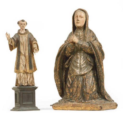A POLYCHROME AND PARCEL-GILT CARVED WOOD FIGURE OF A FEMALE SAINT