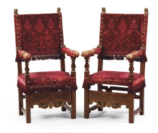 A PAIR OF ITALIAN PARCEL-GILT WALNUT AND FIGURED WALNUT ARMCHAIRS